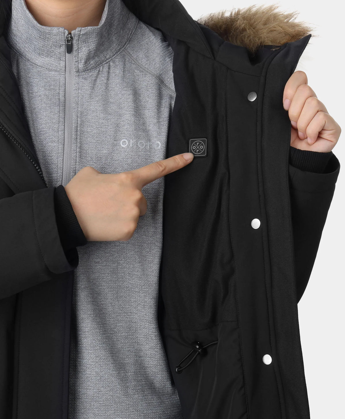 Power button located on the inside left chest