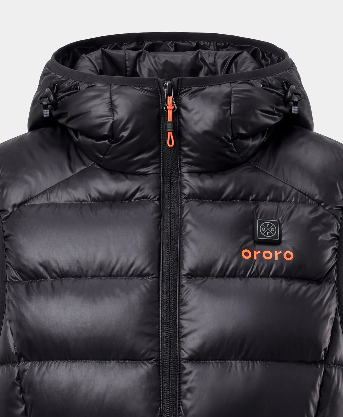 Close-up front view of a black hooded down vest with the ororo logo and a power button on the chest.