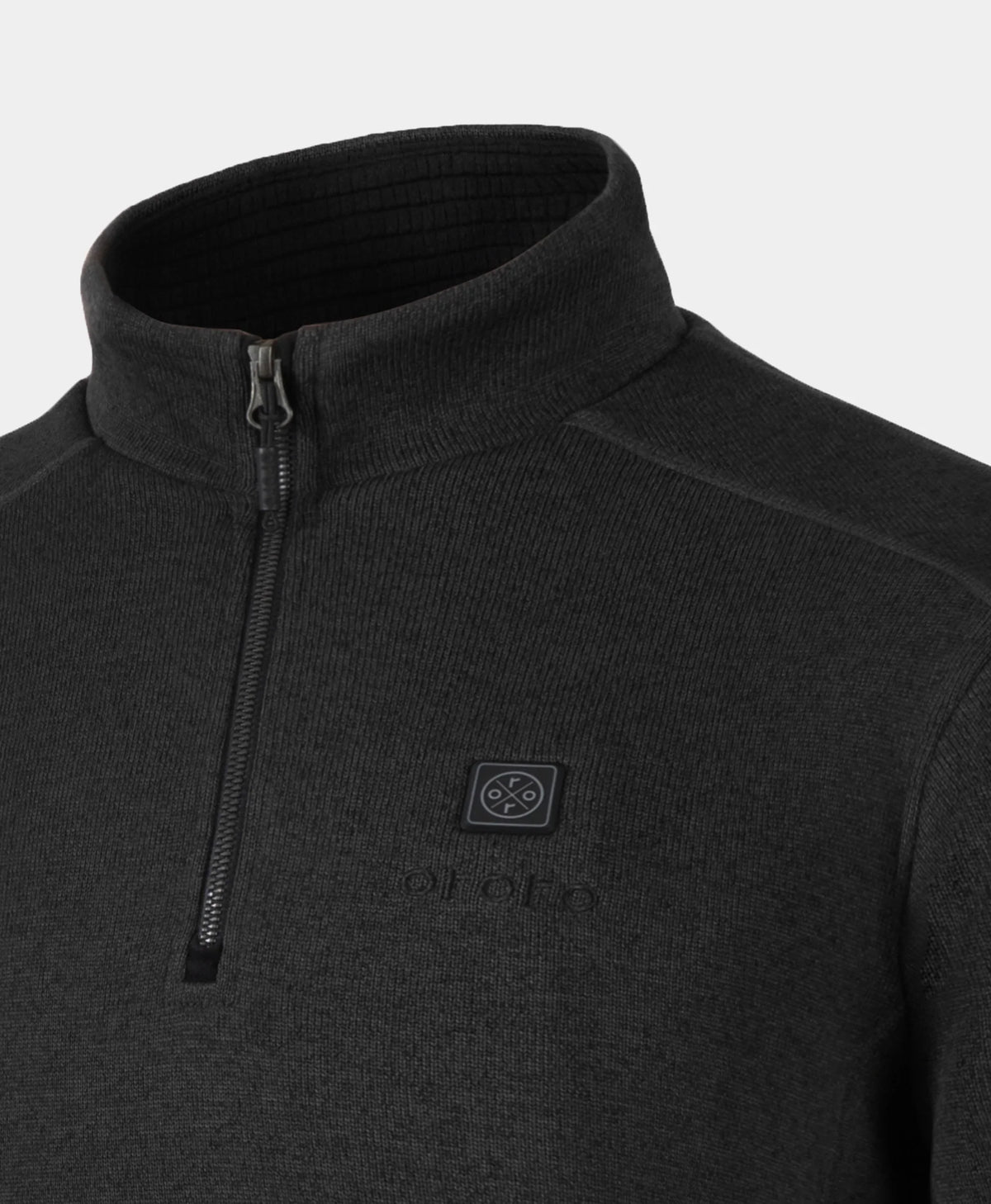 Close-up of a dark charcoal gray ribbed knit quarter-zip pullover sweater jacket